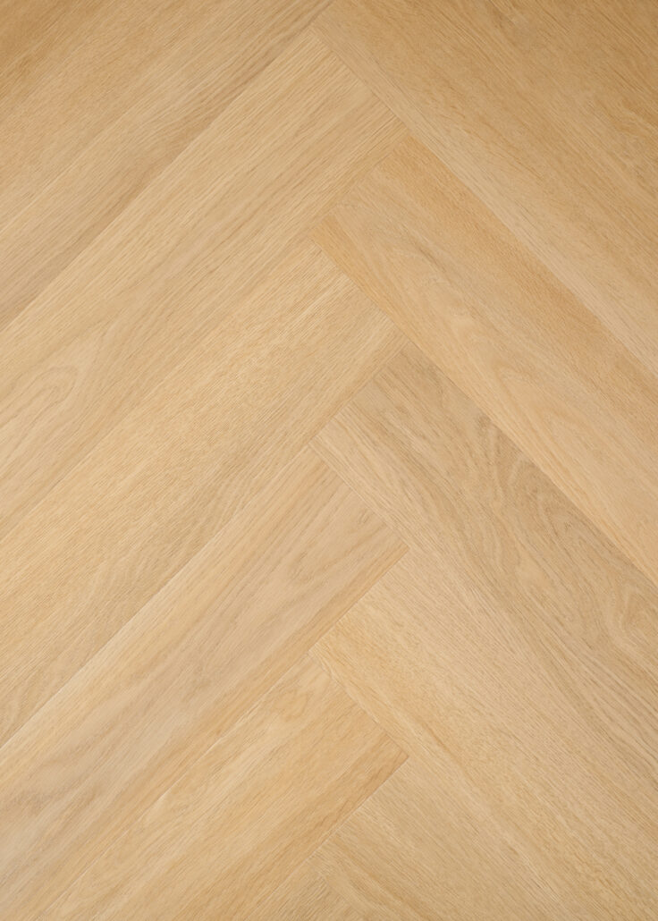 Tucker Oak Beige — Laminate Herringbone